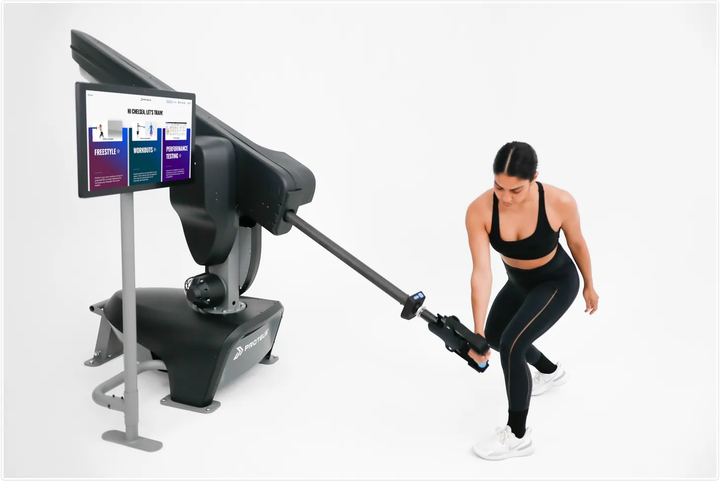 A client performing a rotational pull on a Proteus machine
